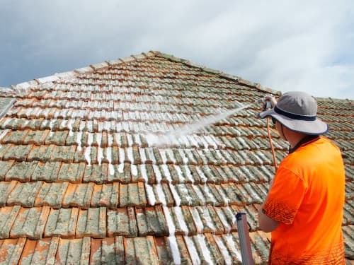 terracotta roof being treated