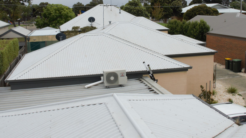 Cement roof after moss treatment, showing clean surface